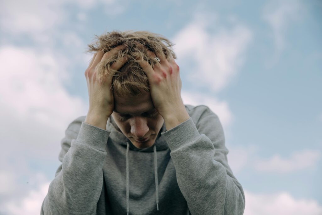 young person struggling with digital stress